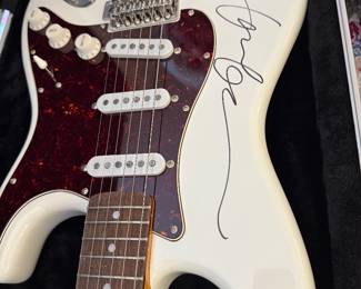 Guitar Squier&nbsp;&nbsp;Stratocaster Signed by&nbsp;&nbsp;&nbsp;Wiz khalifa.&nbsp;&nbsp;