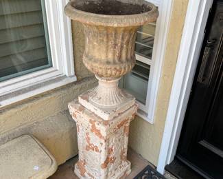 pair of front door urns and pedastles