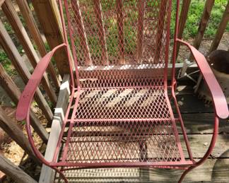 One of two outdoor chairs
