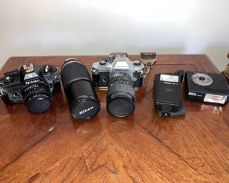 069-MBR: Pair of Vintage Nikon 35mm Cameras