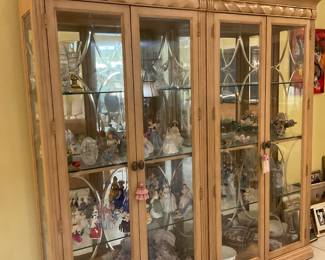 Set of 2 Large wooden display cabinets in natural color.. three glass shelves with mirrored backs. Measures 82”x41”x16” each
