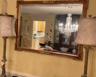Gold framed mirror 29”x29”. Pair of console 38” lamps in beige pattern shade