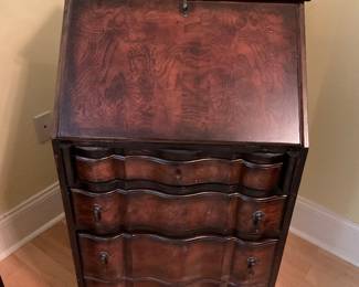 Cute wooden secretary.. opens for writing with bottom drawers for filing. 42”x24”x20” 