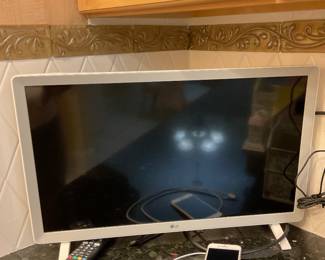 LG 24” TV…   Gold iPhone model A1660 with C cable