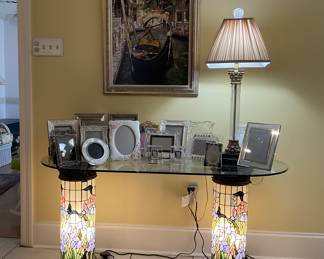 Awesome oval glass top table featuring set of two light up Tiffany style bases