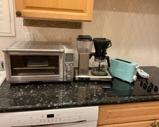 Kitchen small appliances… toaster over, coffee pot/bean grinder all in one, mini toaster