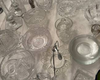 Large collection of crystal serving pieces, bowls, plates, buckets