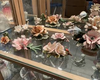 Collection of Capodimonte porcelain flowers