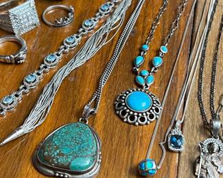 Sky blue necklace in the middle with 5 stations is Barse