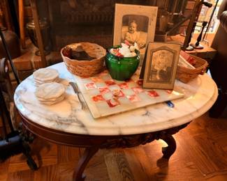 Antique Marble Top Round Table Green Glass Vase Wicker Baskets Framed Photos Vintage Furniture
