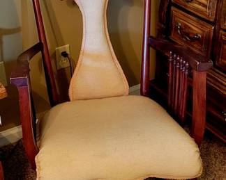 Antique embroidered rocking chair. 