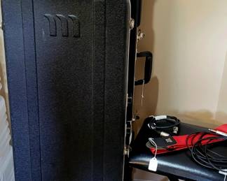 Guitar cases and musician gear. 