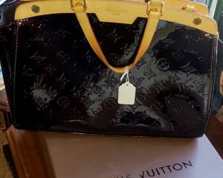 Louis Vuitton purse in original box. 
