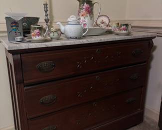 antique chest of drawers With marble top 