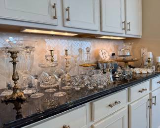 Brass candlesticks, contemporary martini glasses, Badash lead crystal vase, crystal decanters and biscuit jar