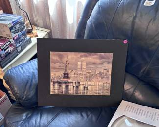 Living room including blue recliner