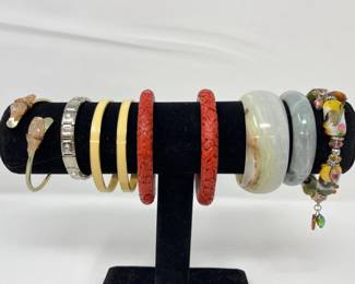 273 13VintageBraceletsCarvedCinnabarTrifariMore