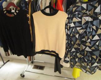 2 racks of luxury brand clothing plus a few closets upstairs