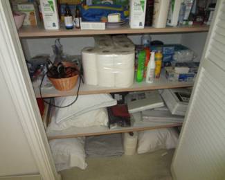 Linen closet. A good amount of newer pillows and sheets