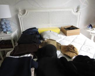 Beautiful vintage headboard on newer plush mattress, plus pants,hats, shoes