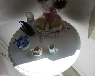 White end table with china