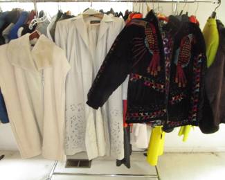 2 racks of luxury brand clothing plus a few closets upstairs