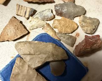 worked flint, dart points, potshards