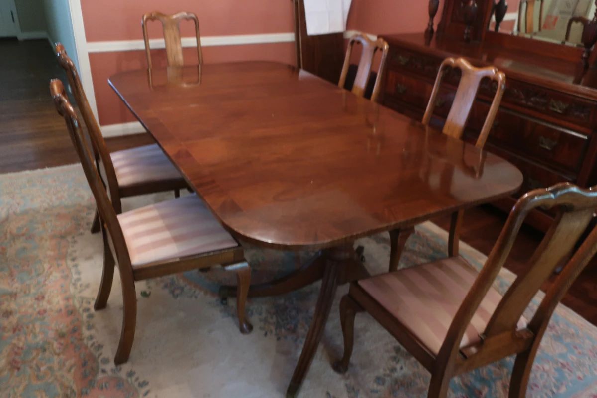 $   495.00   Dining  room  table  and  chairs.   3  18" leaves