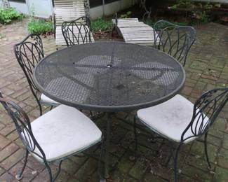 50.00 metal patio table and 5 chairs