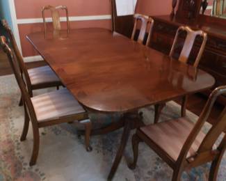 $   495.00   Dining  room  table  and  chairs.   3  18" leaves