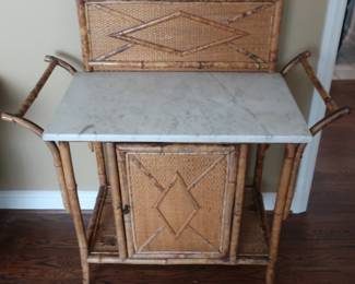 $195.00   Bamboo and  rattan   style  cart  with  marble  top.  needs tlc