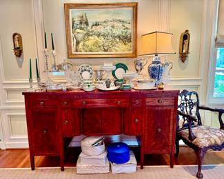 Antique buffet loaded with Wedgwood china, silver, Herend, and crystal.