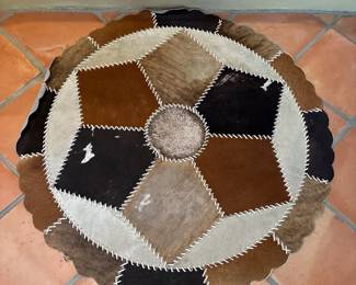 Patched Cowhide Rug
