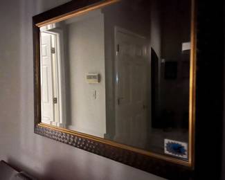 Several Framed Mirrors