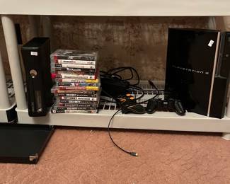 Xbox 360 and PlayStation 3 with games plus controllers