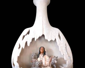 Indigenous woman with wolves