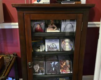 CD storage cabinet with slide out shelving