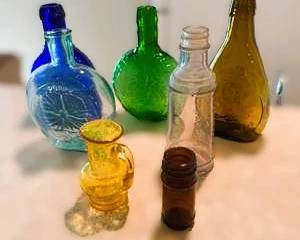 Vintage Glass Bottle Lot – Colored Blue, Green, Amber & Clear Embossed Bottles