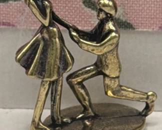 Miniature brass figures.