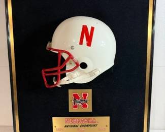Framed Husker helmet, National Champions plaques. 