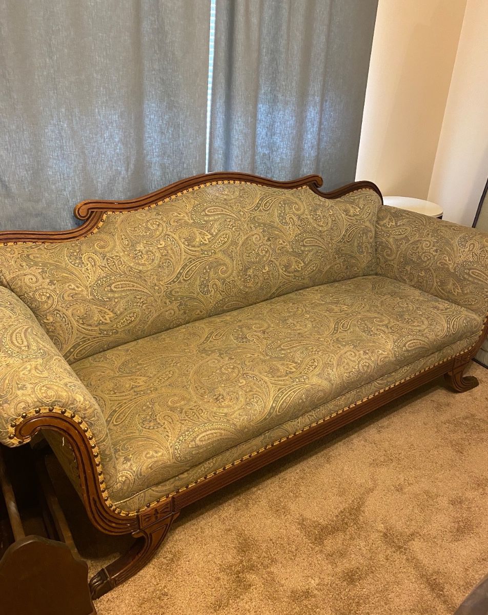 Recently upholstered Victorian sofa/lounge. Green paisley fabric