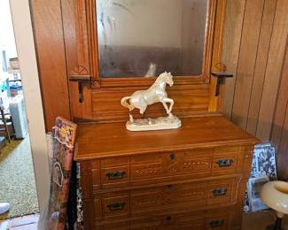 antique dresser with candle shelving 