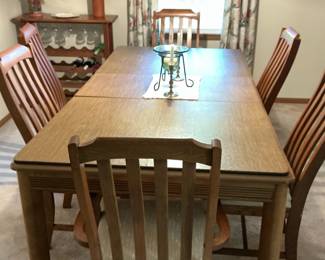 Oak Mission Style Dining Set with Six Chairs and Dining Pad Covers