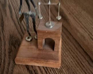 Metal Lawyer Figure with Scales of Justice on Wooden Base
