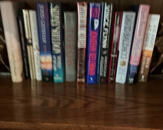 Collection of John Grisham and Vince Flynn Novels