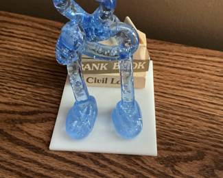 Blue Glass Figurine of a Person Reading