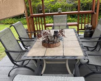 #36 - $280 - Aluminium outdoor dining table is 5'6" x 3'5" x 27Hset 6 armchairs 