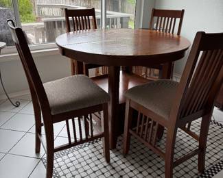 #13 - $400 - Kitchen table high top 47D x47x36T with 4 high chairs & storage in bottom - Mission style 