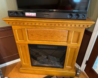 #7 - $200 - Electric fireplace 42Lx26 angle for corner x40T