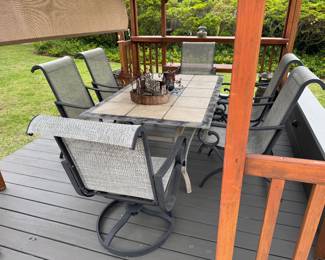 #36-$280-  Aluminum outdoor dining table is 5'6" x 3'5" x 27Hset 6 armchairs 